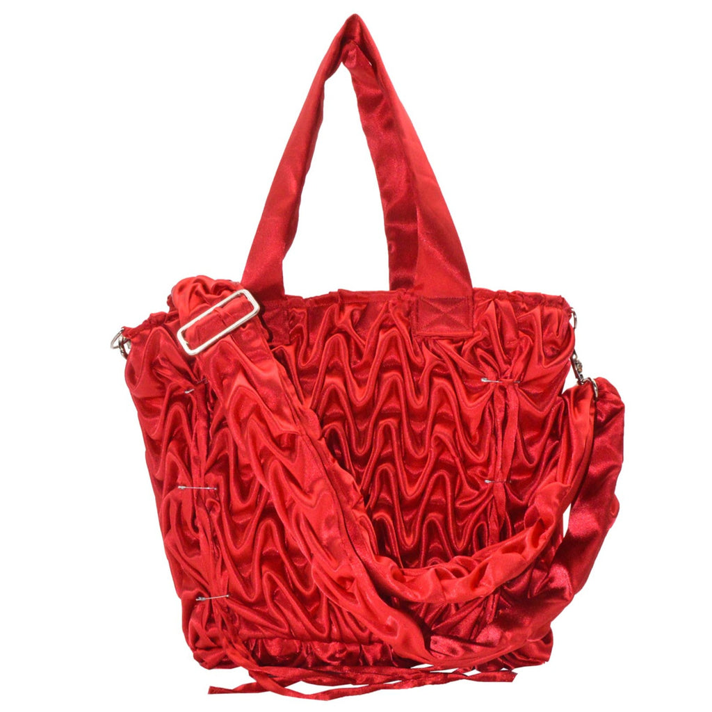 glossy red hypnotica with an adjustable crossbody strap 
